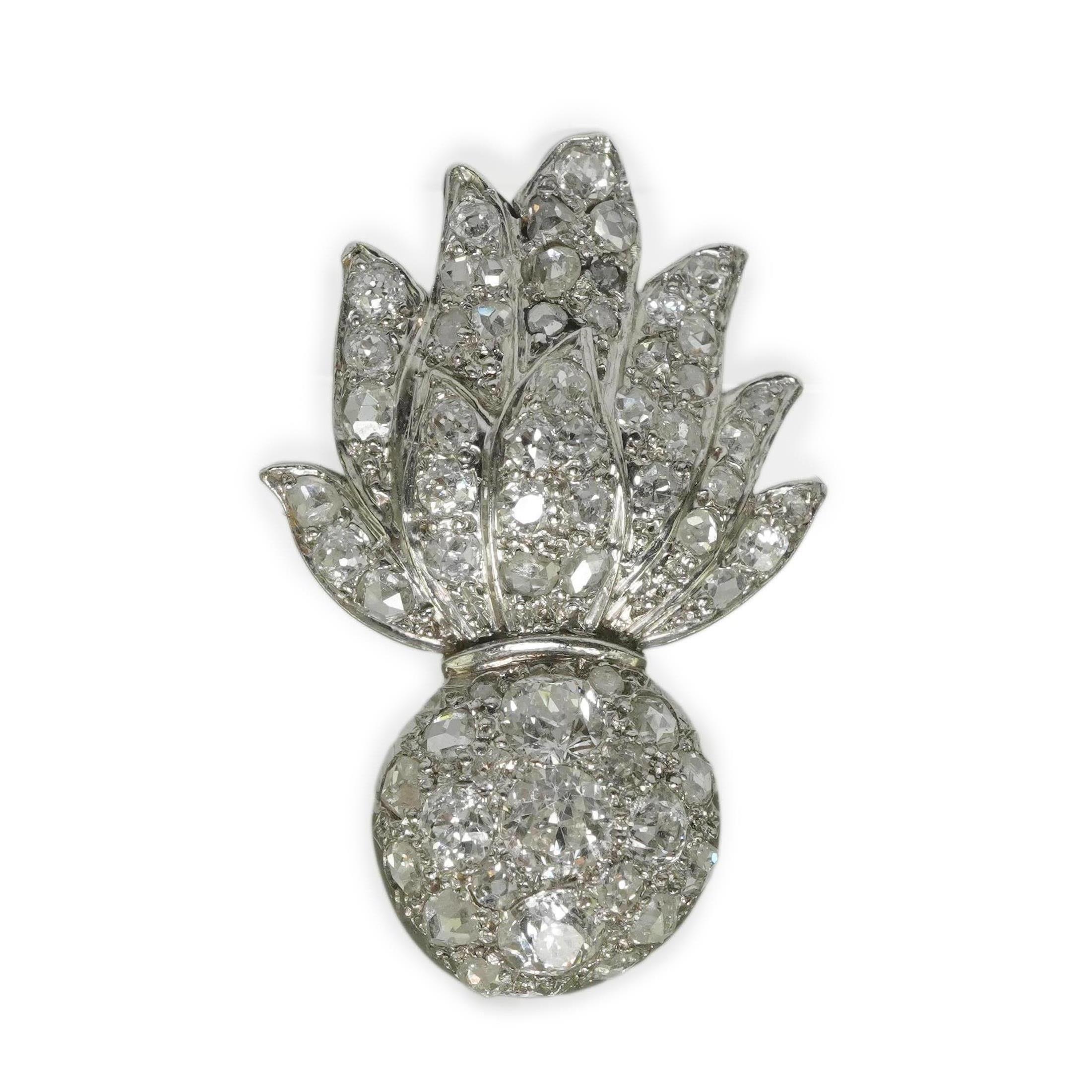 A mid 20th century white gold and pave set diamond Royal Fusiliers sweetheart brooch